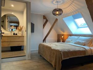 Postel nebo postele na pokoji v ubytování B&B Kuiper in Friesland