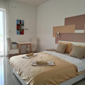 Kristal Apartmani - Banja Ždrelo tesisinde bir odada yatak veya yataklar