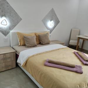 Postel nebo postele na pokoji v ubytování Kristal Apartmani - Banja Ždrelo