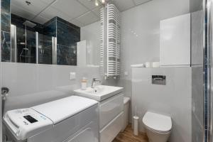 Kúpeľňa v ubytovaní Kasprzaka 29 B-C by Homeprime