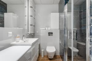 Kúpeľňa v ubytovaní Kasprzaka 29 B-C by Homeprime