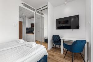 Posteľ alebo postele v izbe v ubytovaní Kasprzaka 29 B-C by Homeprime