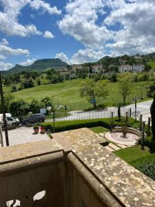 a view from the balcony of a house with a hill at Villa Labor in Pugliano