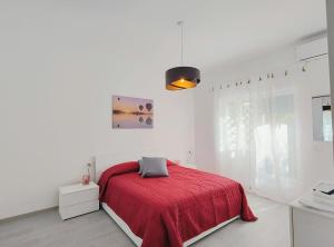 Letto o letti in una camera di Bell'Aria Nettuno