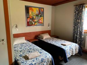 Cama o camas de una habitación en Linnamehe Holiday Centre