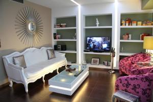TV o dispositivi per l'intrattenimento presso Andromeda Suites