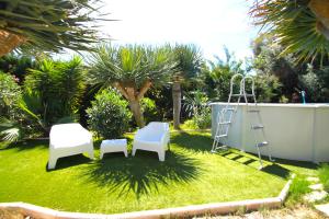 Ogród w obiekcie Chalet CasaTuris en Urb. La Font Sant Joan d´Alacant CH102
