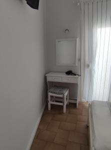 TV a/nebo společenská místnost v ubytování Vetti Rooms