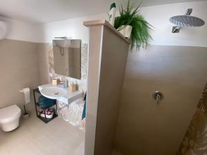 Et badeværelse på Casa vacanza *Villa Marchesina*