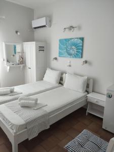 Posteľ alebo postele v izbe v ubytovaní Vetti Rooms + 37 fotografií