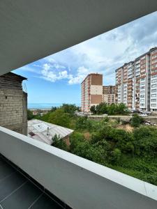 a view of a city from a balcony at Öztürk VIP in Pelitli