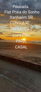 een foto van een strand met de woorden panama flatajaato paella bij Pousada/Flat Praia Do Sonho in Itanhaém