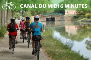 a group of people riding bikes down a path at Pierre Lauragaise in Avignonet-de-Lauragais