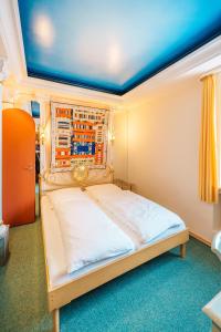 Postel nebo postele na pokoji v ubytování Hotel Plankl