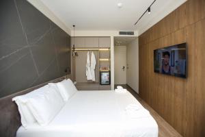 Letto o letti in una camera di Charm Hotel