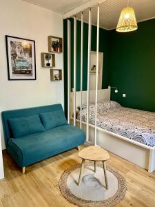 Posteľ alebo postele v izbe v ubytovaní Studio Océan Remblai