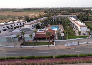 an aerial view of a resort with a pool at Loutsiana Deluxe Apts in Ayia Napa