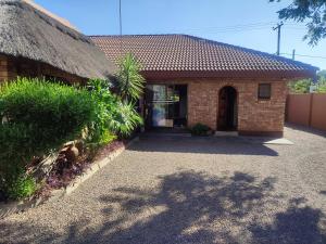 Afbeelding uit fotogalerij van Ditshane Lodge in Gaborone