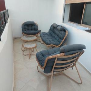 A seating area at Panoramique appartement