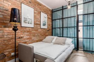 Χώρος καθιστικού στο Deo Plaza - apartamenty w sercu Gdanska by Rent like home