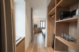 Kuchyň nebo kuchyňský kout v ubytování Hotel Brocco & Posta