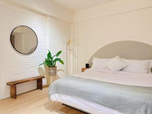 Letto o letti in una camera di Homiday