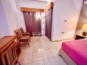 Postel nebo postele na pokoji v ubytování Masaya Hurghada