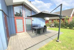 Gallery image of Ferienhaus am See (1 bis 4 Personen), Tretboot, Sauna, Whirlpool, Kamin in Twist