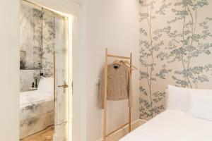 Hotel Tayko Sevilla客房内的一张或多张床位