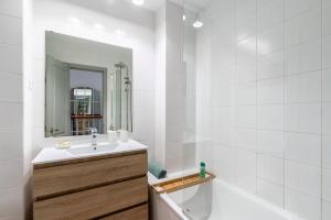 a white bathroom with a sink and a mirror at ALTAVISTA ISLANTILLA GOLF by MSHOLIDAYS in Islantilla +35 photos