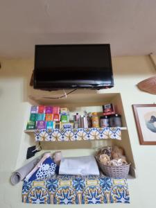 Телевизор и/или развлекательный центр в Il Sentiero