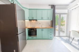 Η κουζίνα ή μικρή κουζίνα στο apartment kaminaki beach +10 φωτογραφίες