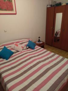 Ένα ή περισσότερα κρεβάτια σε δωμάτιο στο Apartman Zima
