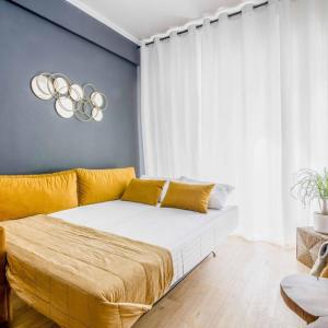 Säng eller sängar i ett rum på Classy Apartment in Athens