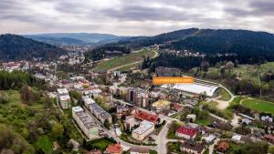 an aerial view of a town in the mountains at Centrum Krynica Zdrój, Sun & Snow in Krynica Zdrój