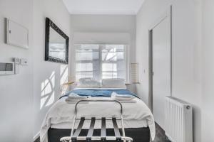 Postel nebo postele na pokoji v ubytování Grosvenor 3121 Richmond