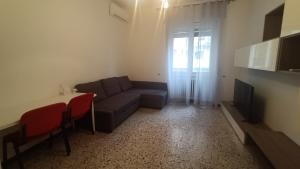a living room with a couch and a table at Battisti in Pavia