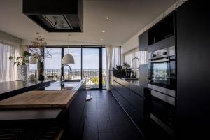 Η κουζίνα ή μικρή κουζίνα στο bellevue, Vue Panoramique Flipper, Billard, jeux