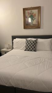 Кровать или кровати в номере La Terrazza Vercelli Bed & Charme