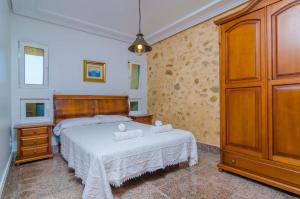 Ein Bett oder Betten in einem Zimmer der Unterkunft Sa Montanyeta