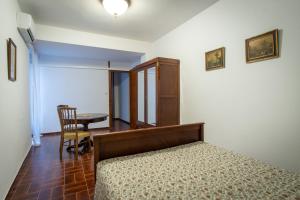 Postel nebo postele na pokoji v ubytování Pego CC