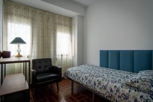 Postel nebo postele na pokoji v ubytování Pego CC