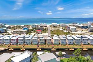 an aerial view of a resort with the ocean at Waterside Village Cottage 3220 by Pristine Properties Vacation Rentals in Mexico Beach