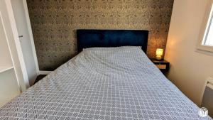 Postel nebo postele na pokoji v ubytování Gîte du Pin