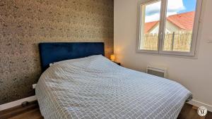Postel nebo postele na pokoji v ubytování Gîte du Pin