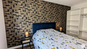 Postel nebo postele na pokoji v ubytování Gîte du Pin