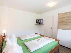 Postel nebo postele na pokoji v ubytování Apartment Barbara-1 by Interhome