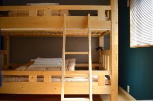 Postel nebo postele na pokoji v ubytování Greenwood Hostel