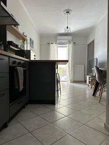 A cozinha ou kitchenette de Iris Apartment Nafpaktos