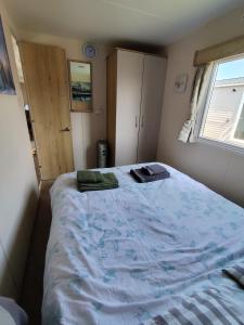 G & M Static Caravan Edinburgh客房内的一张或多张床位